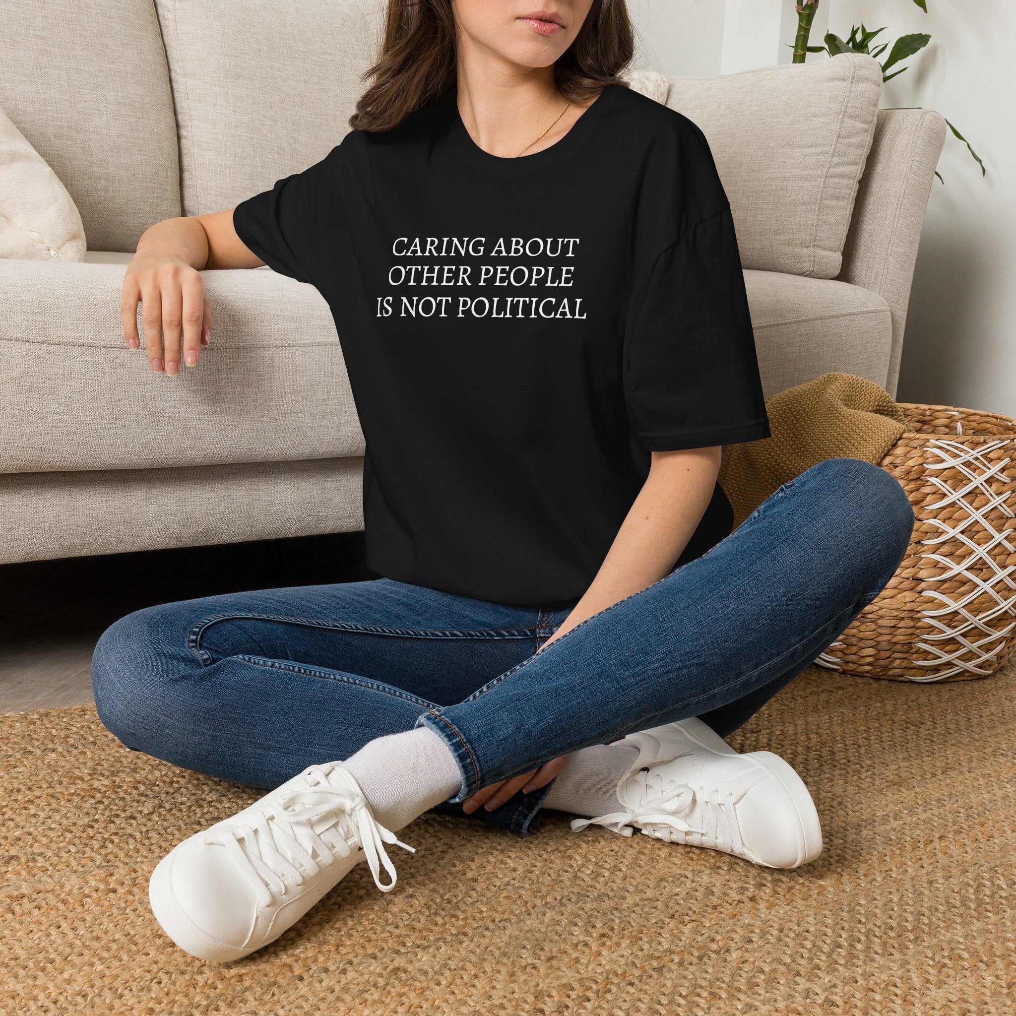 CARING ABOUT OTHER PEOPLE IS NOT POLITICAL T-SHIRT