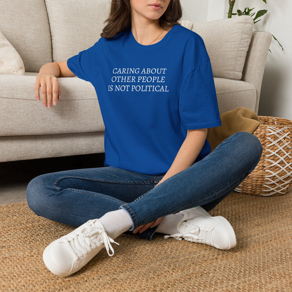 CARING ABOUT OTHER PEOPLE IS NOT POLITICAL T-SHIRT