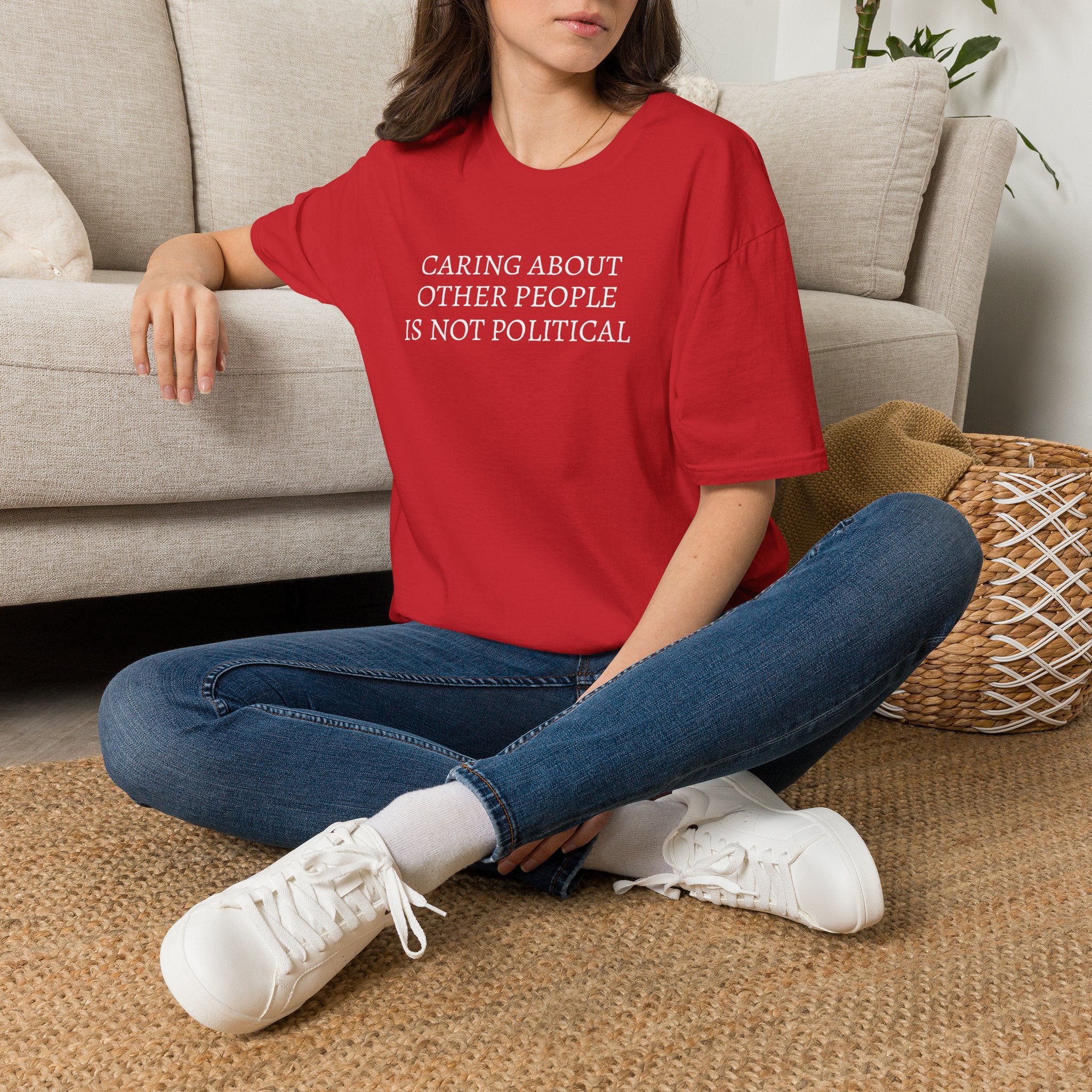 CARING ABOUT OTHER PEOPLE IS NOT POLITICAL T-SHIRT